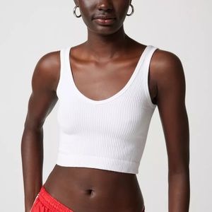 Urban Outfitters cropped out from under tank top